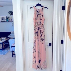 Long light pink gown, gray flowers + gold belt.